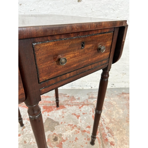 106 - A Regency mahogany drop leaf Pembroke table