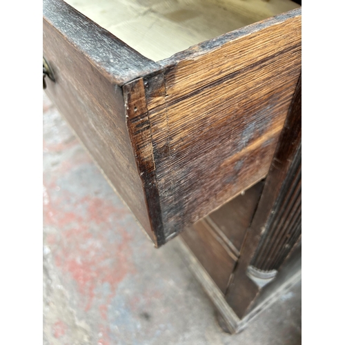 115 - A George III mahogany chest of two short over three long drawers