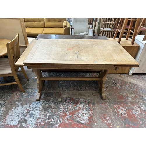 16 - An oak rectangular extending dining table - approx. 137cm long x 198cm extended x 84cm wide x 78cm h... 