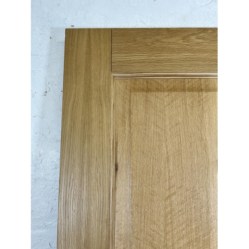 20 - A modern oak interior door - approx. 199cm high x 77cm wide