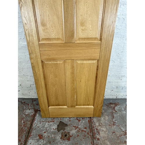 20A - A modern oak interior door - approx. 198.5cm high x 76cm wide