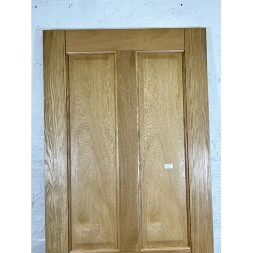 20A - A modern oak interior door - approx. 198.5cm high x 76cm wide