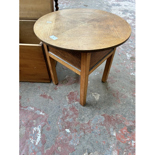 28 - Three pieces of mid 20th century furniture, one oak circular sewing table, one beech and red vinyl k... 