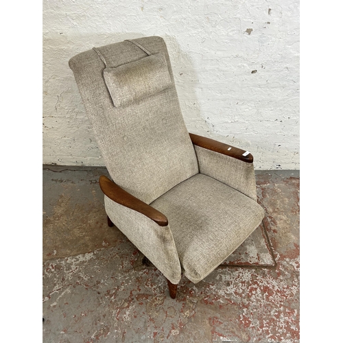 32 - A 1960s teak and fabric upholstered rocking armchair, stamped Norsk Pat. NR. 96981 - approx. 100cm h... 