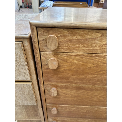 40 - A mid 20th century Meredew oak chest of five drawers