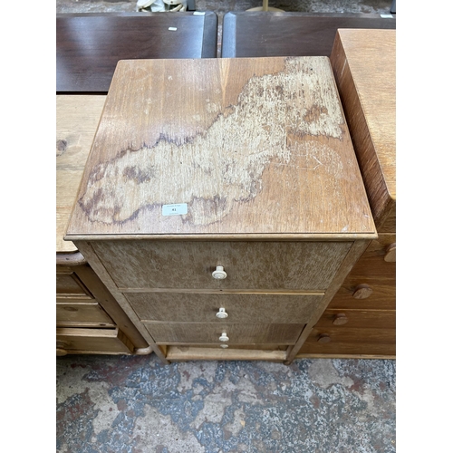 41 - A mid 20th century oak veneer chest of four drawers