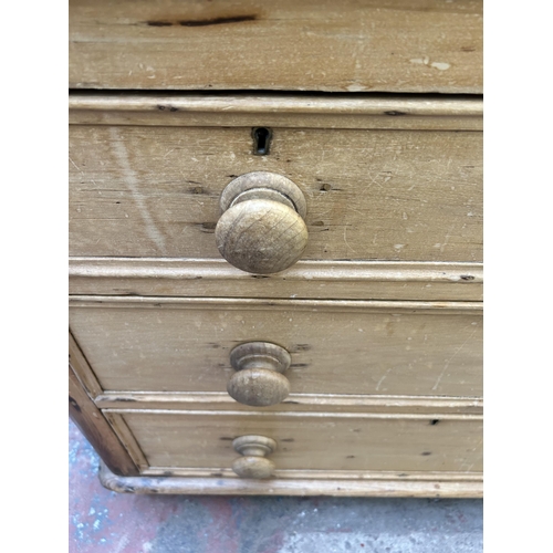 43 - A Victorian pine chest of two short over two long drawers