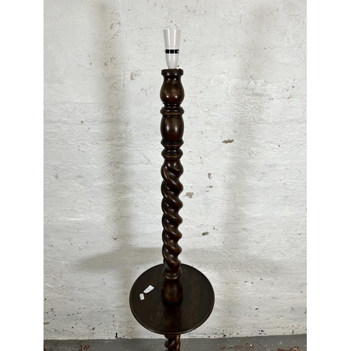 44 - A 19th century style mahogany barley twist standard lamp - approx. 163cm high