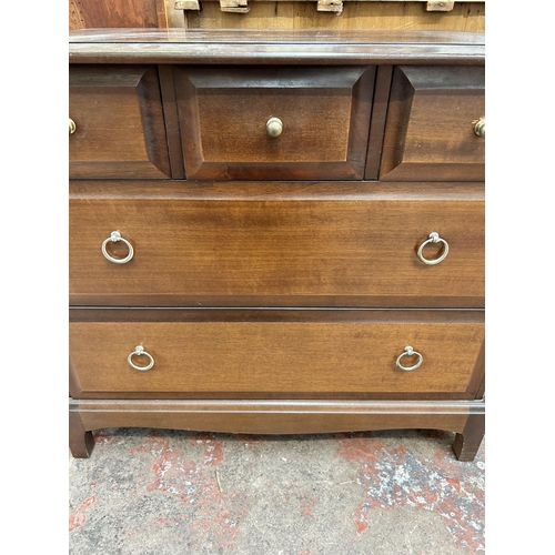 47 - A Stag Minstrel mahogany chest of three short over two long drawers