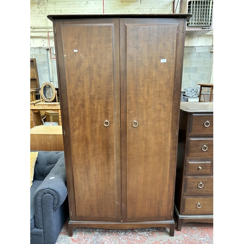 50 - A Stag Minstrel mahogany double wardrobe