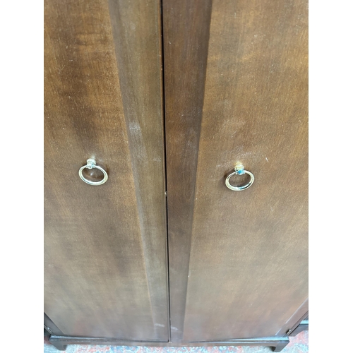 50 - A Stag Minstrel mahogany double wardrobe