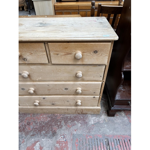 59 - A Victorian style pine chest of two short over three long drawers