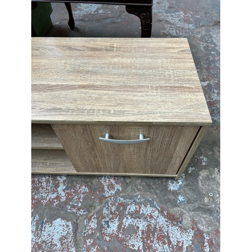 61 - A modern oak effect TV stand