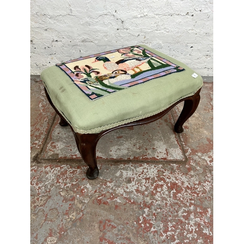 62 - A Victorian style mahogany and tapestry upholstered foot stool