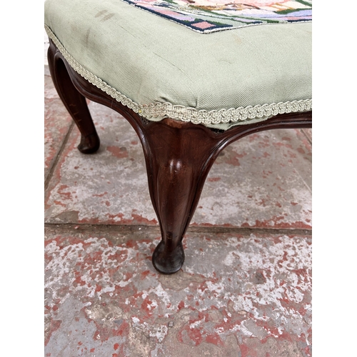 62 - A Victorian style mahogany and tapestry upholstered foot stool