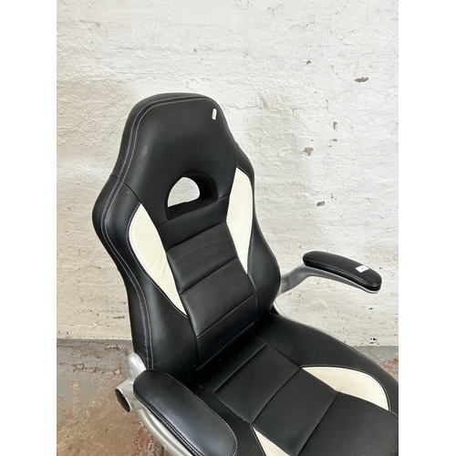 67 - A modern black and white leatherette gaming desk chair