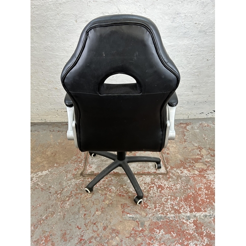 67 - A modern black and white leatherette gaming desk chair