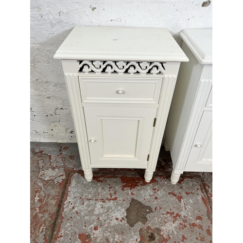 69 - A pair of modern white painted bedside cabinets