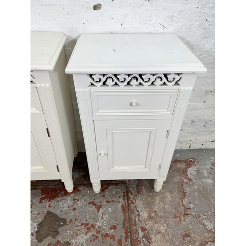 69 - A pair of modern white painted bedside cabinets