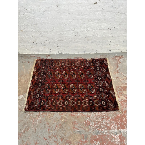 73 - A vintage Turkman Tekke rug - approx. 115cm x 84cm