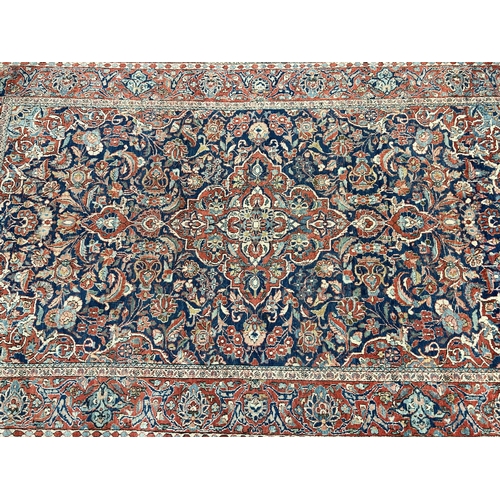 74 - A vintage Kashan rug - approx. 207cm long x 131cm wide