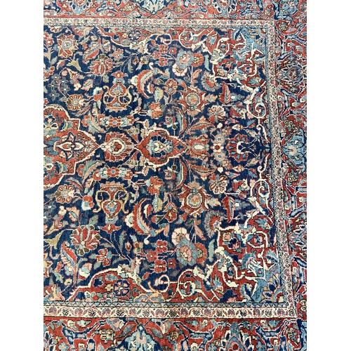 74 - A vintage Kashan rug - approx. 207cm long x 131cm wide