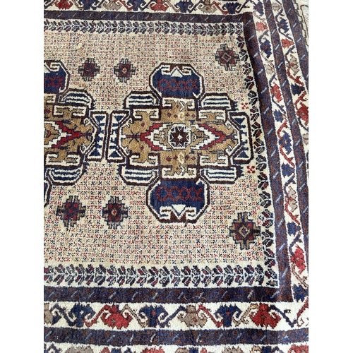 74A - A vintage Afghan hand made rug