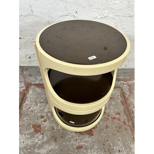 79 - A 1970s plastic cylindrical bedside cabinet