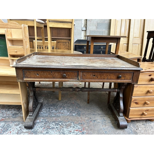 8 - A 19th century mahogany two drawer console table with lower stretcher and carved supports