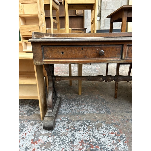 8 - A 19th century mahogany two drawer console table with lower stretcher and carved supports