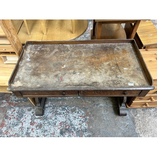 8 - A 19th century mahogany two drawer console table with lower stretcher and carved supports