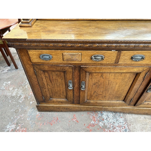 81 - An early 20th century oak mirror back sideboard - approx. 186cm high x 159cm wide x 41cm deep