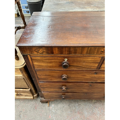 86 - A George III inlaid mahogany chest of two short over three long drawers with bracket supports