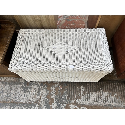 94 - A white painted wicker blanket box