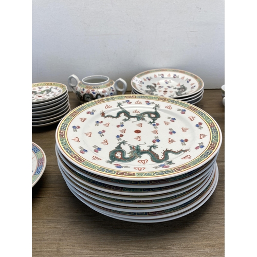 249 - A collection of Chinese Dragon pattern porcelain dinnerware