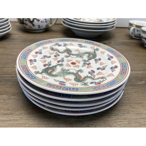 249 - A collection of Chinese Dragon pattern porcelain dinnerware