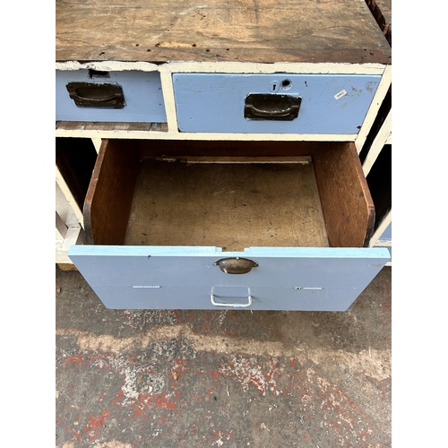 119 - A pair of late 19th/early 20th century Hobbs & Co. blue and white painted shop cabinets - approx. 94... 