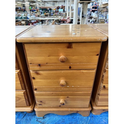 121 - Three modern pine bedside chests of three drawers