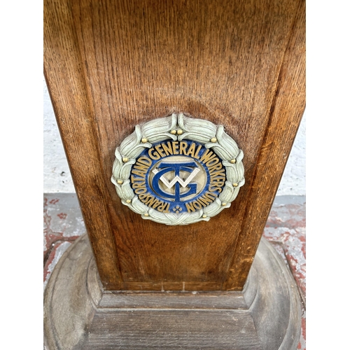 130 - A mid/late 20th century Transport and General Workers Union oak and glass remembrance table - approx... 