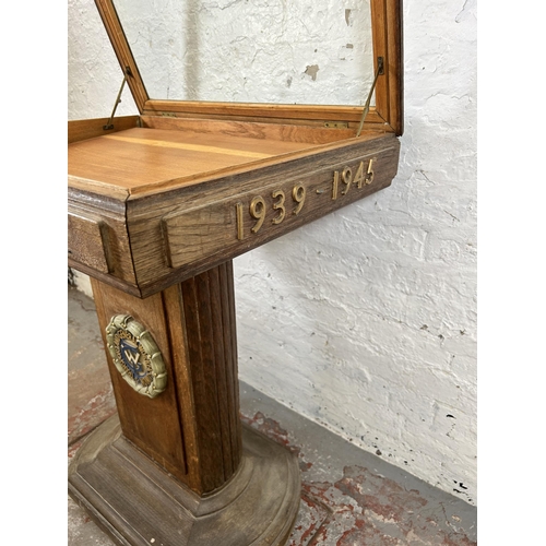 130 - A mid/late 20th century Transport and General Workers Union oak and glass remembrance table - approx... 