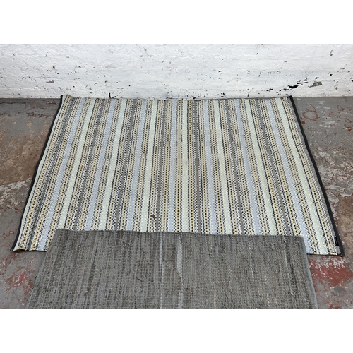 149 - Two modern rugs, one Blonus 90% leather - approx. 141cm long x 72cm wide and one Habitat - approx. 1... 