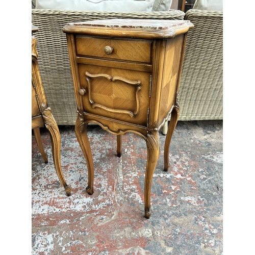 161 - Two French walnut and marble bedside cabinets