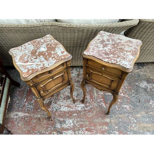 161 - Two French walnut and marble bedside cabinets