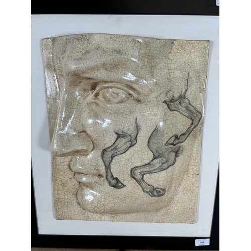 168 - A modern Michelangelo and Leonardo Da Vinci wall sculpture - approx. 62cm high x 54cm wide