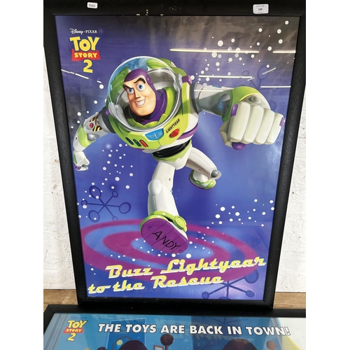 169 - Two framed Disney Toy Story 2 film posters