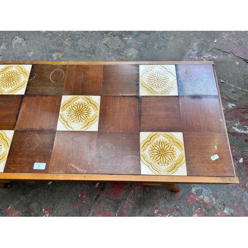 27 - A mid 20th century beech rectangular coffee table with ceramic and teak tile inserts