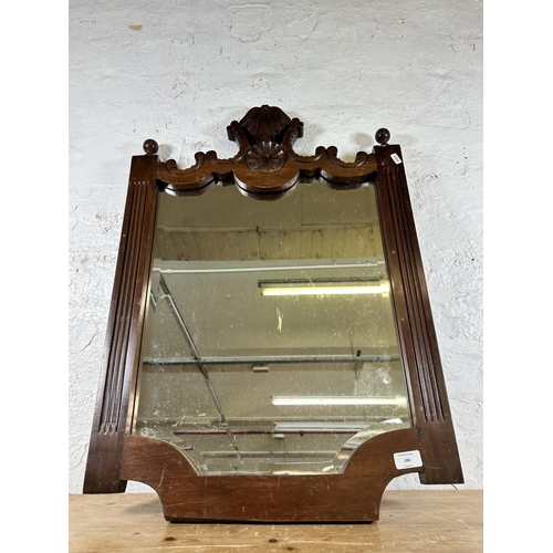 179 - A George II style walnut and gilt framed wall mirror - approx. 90cm high x 47cm wide