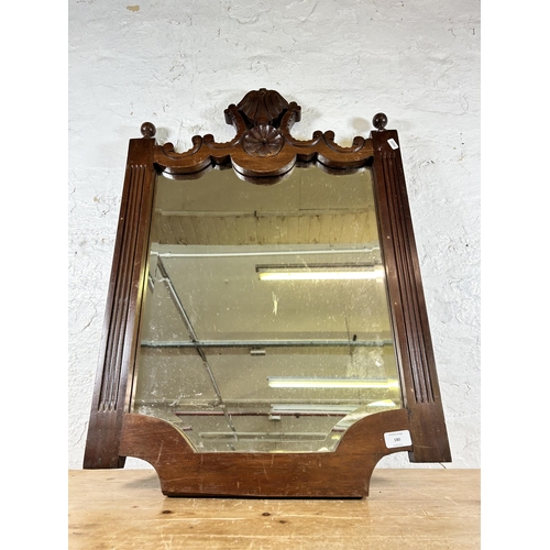 179 - A George II style walnut and gilt framed wall mirror - approx. 90cm high x 47cm wide