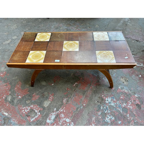 27 - A mid 20th century beech rectangular coffee table with ceramic and teak tile inserts