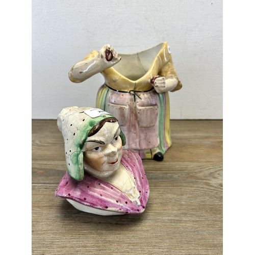 204 - A 19th century Staffordshire pottery jar in the form of a woman - approx. 30cm high